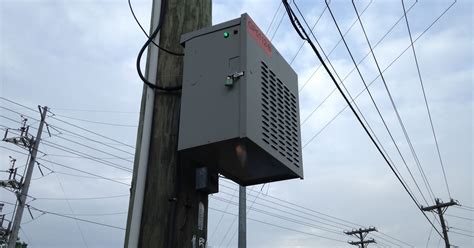 what is metal box on telephone poles in tucson az|mystery box on utility pole.